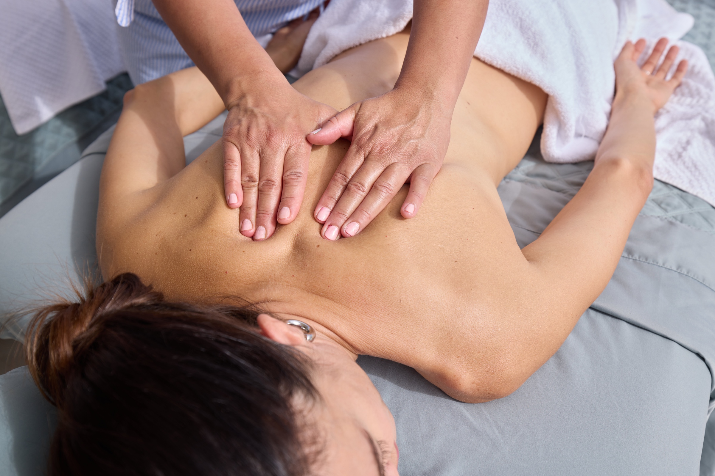 A woman receiving a massage