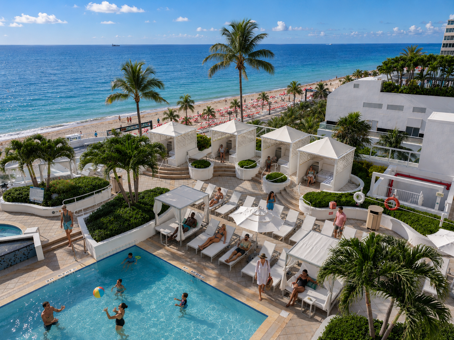 Pool deck with men and women in the pool and sitting on the pool chaise and cabanas